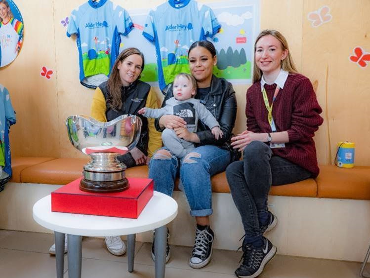 Rachael Blackmore with baby Frankie and Jessica and Jen from Alder Hey Children's Charity