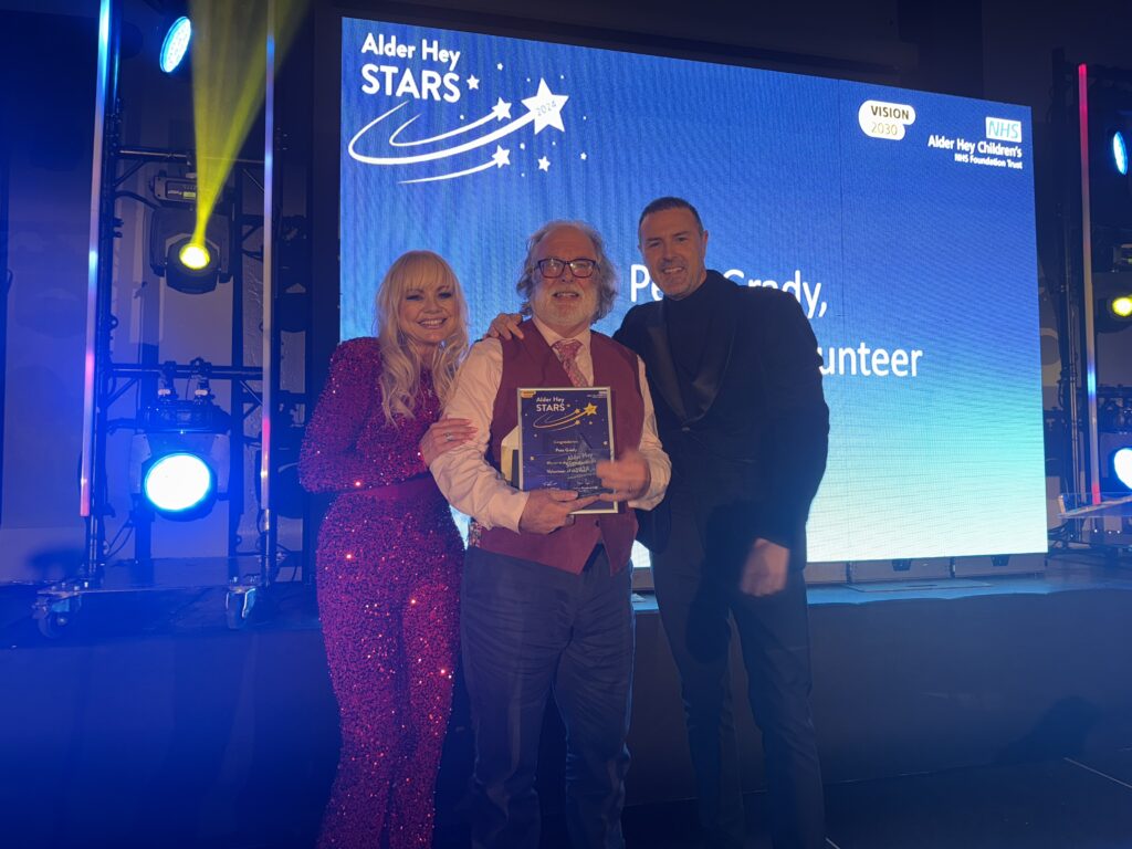 Volunteer of the year winner Pete Grady pictured with Paddy McGuinness and Claire Simmo