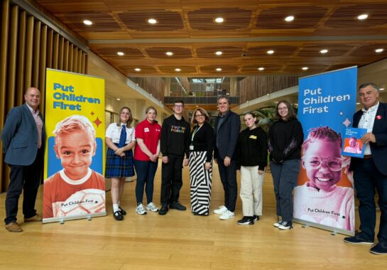 Photo of a group of people from the Put Children First event