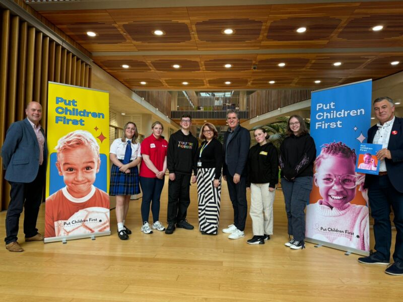 Photo of a group of people from the Put Children First event