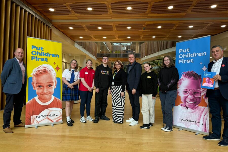 Photo of a group of people from the Put Children First event