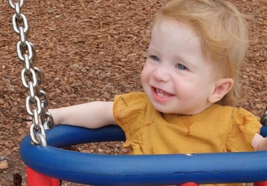 Rosie on a swing