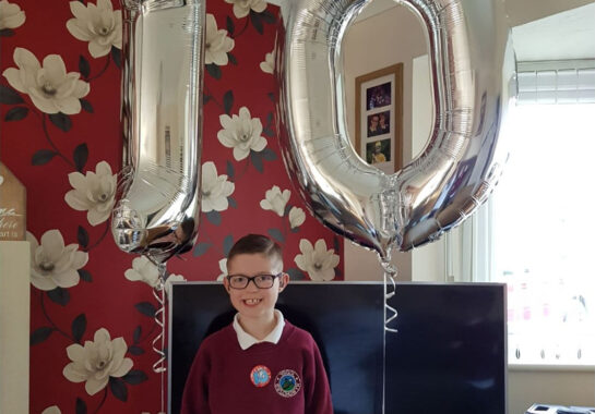 Ryley with a birthday balloon