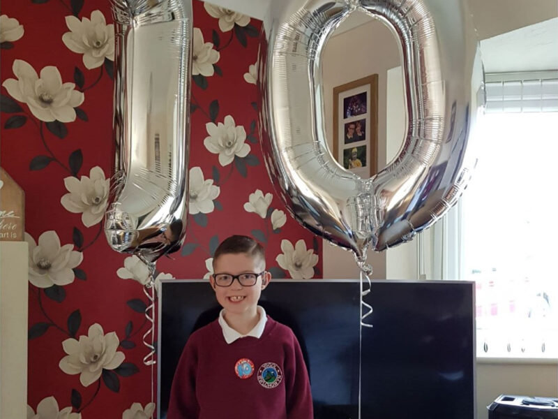 Ryley with a birthday balloon